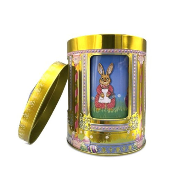 En plåtburk i motiv av en påskspeldosa i färgen guld - dekoration - plåtburk